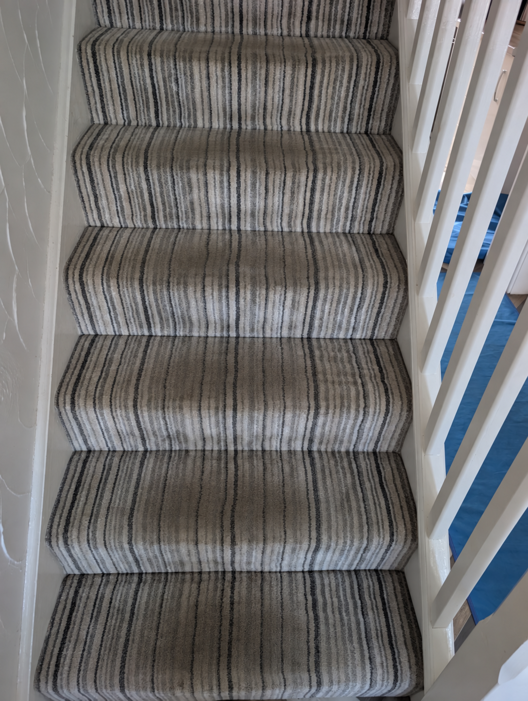 Dark stair carpet restored with professional cleaning in Rotherham, after professional cleaning